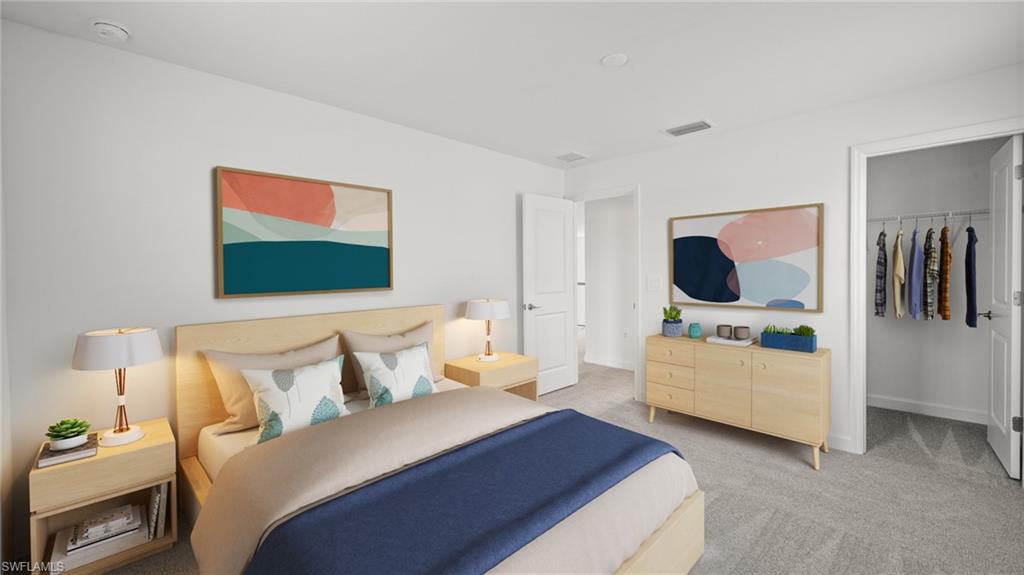 21090 Verawood Loop Estero, FL 33928 - Photo 15 of 17 a bedroom with a bed and furniture