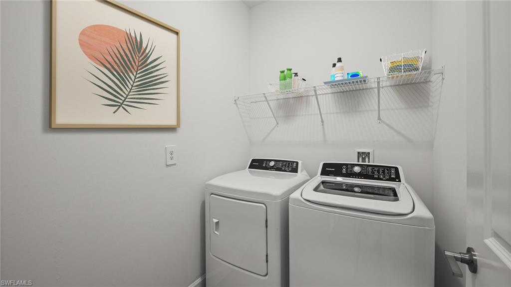 21090 Verawood Loop Estero, FL 33928 - Photo 17 of 17 a utility room with dryer and washer