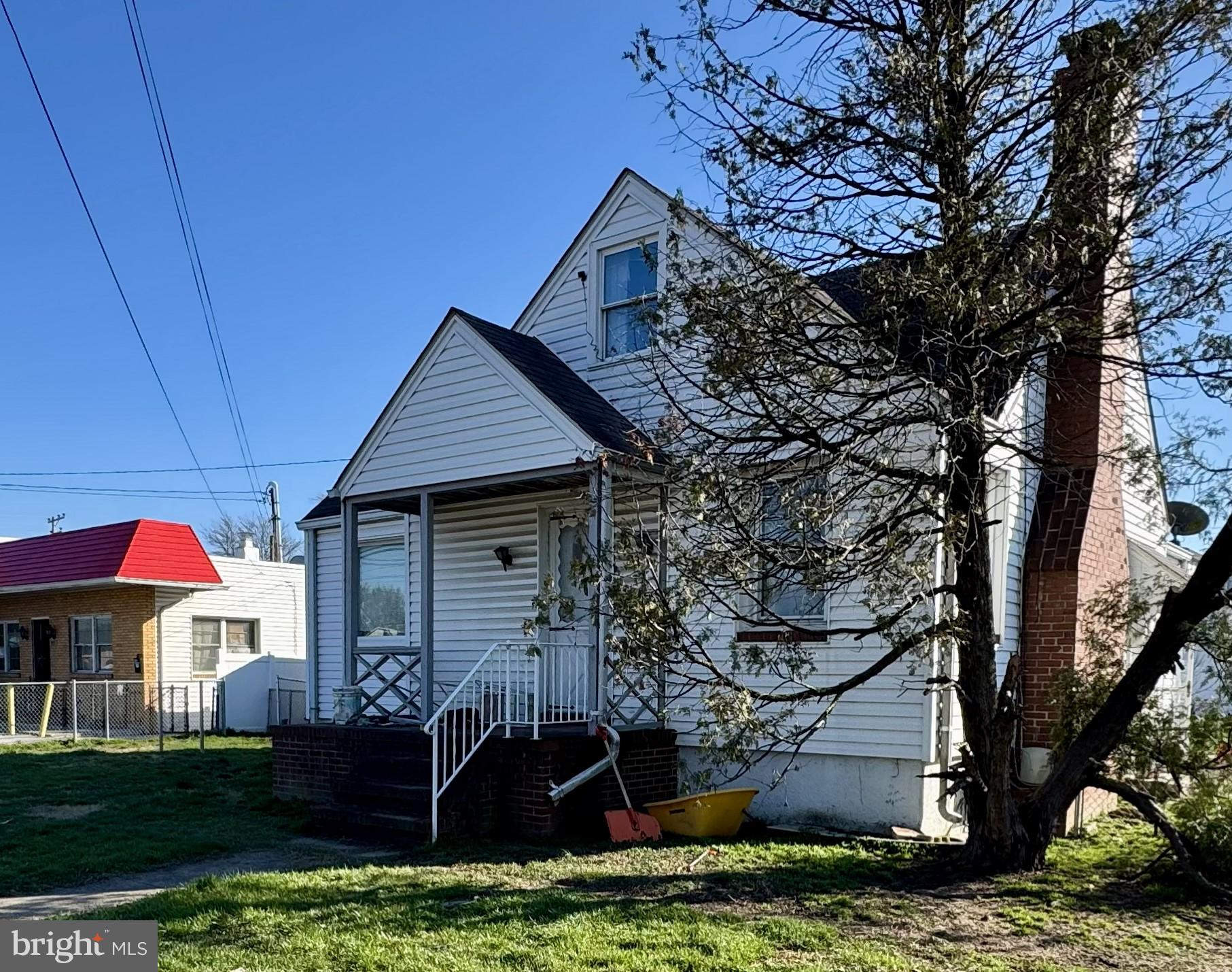 Oakwood Road Baltimore, MD 21222 - Photo 2 of 7 a front view of a house with yard