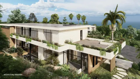 an aerial view of a house with outdoor space and sitting area