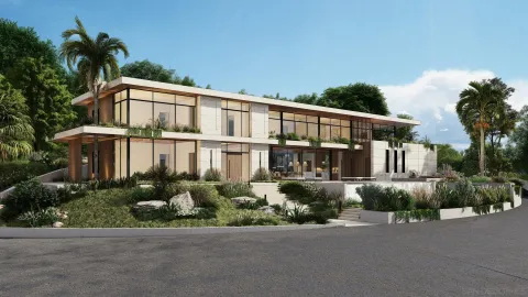 a front view of a house with a garden