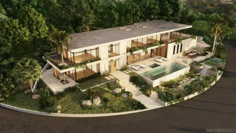 a aerial view of a house with a yard