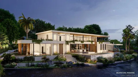 a front view of a house with a yard and potted plants