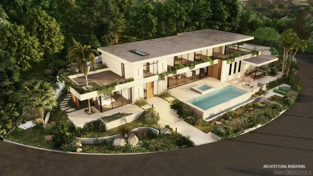 an aerial view of a house with yard