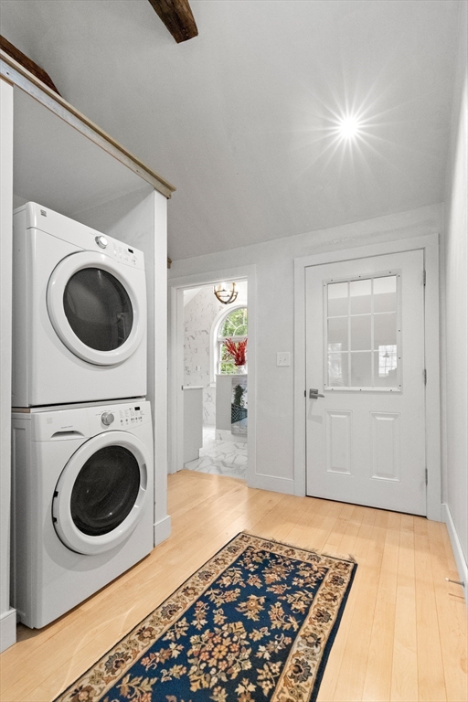 30 Sunrise Road Boxford, MA 01921 - Photo 16 of 30 a view of a hallway with washer and dryer