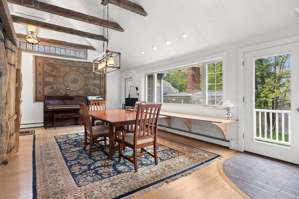 30 Sunrise Road Boxford, MA 01921 - Photo 6 of 30 a dining room with wooden floor and a rug