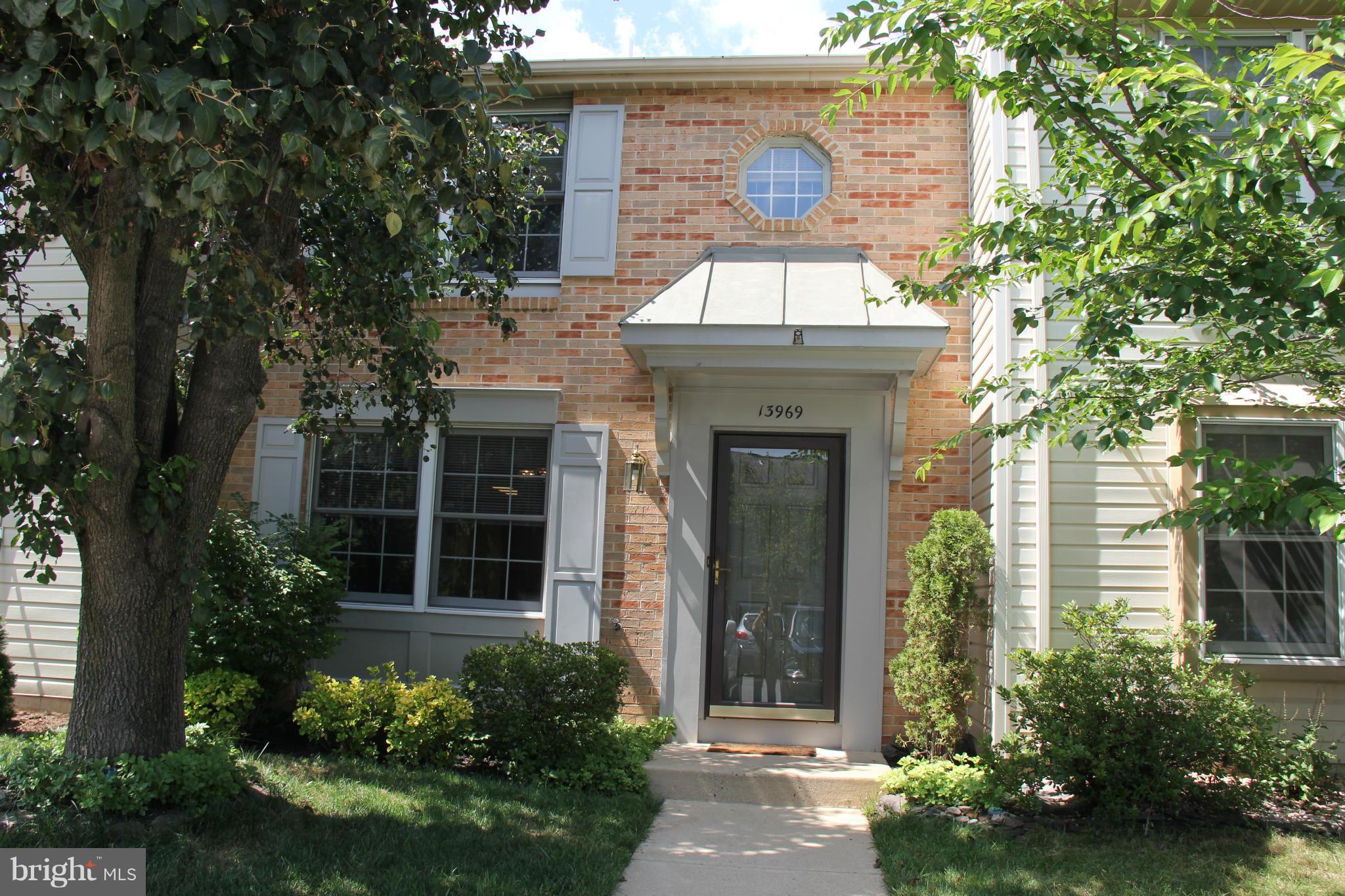 13969 Baton Rouge Court Centreville, VA 20121 - Photo 2 of 20 front view of a house with a yard