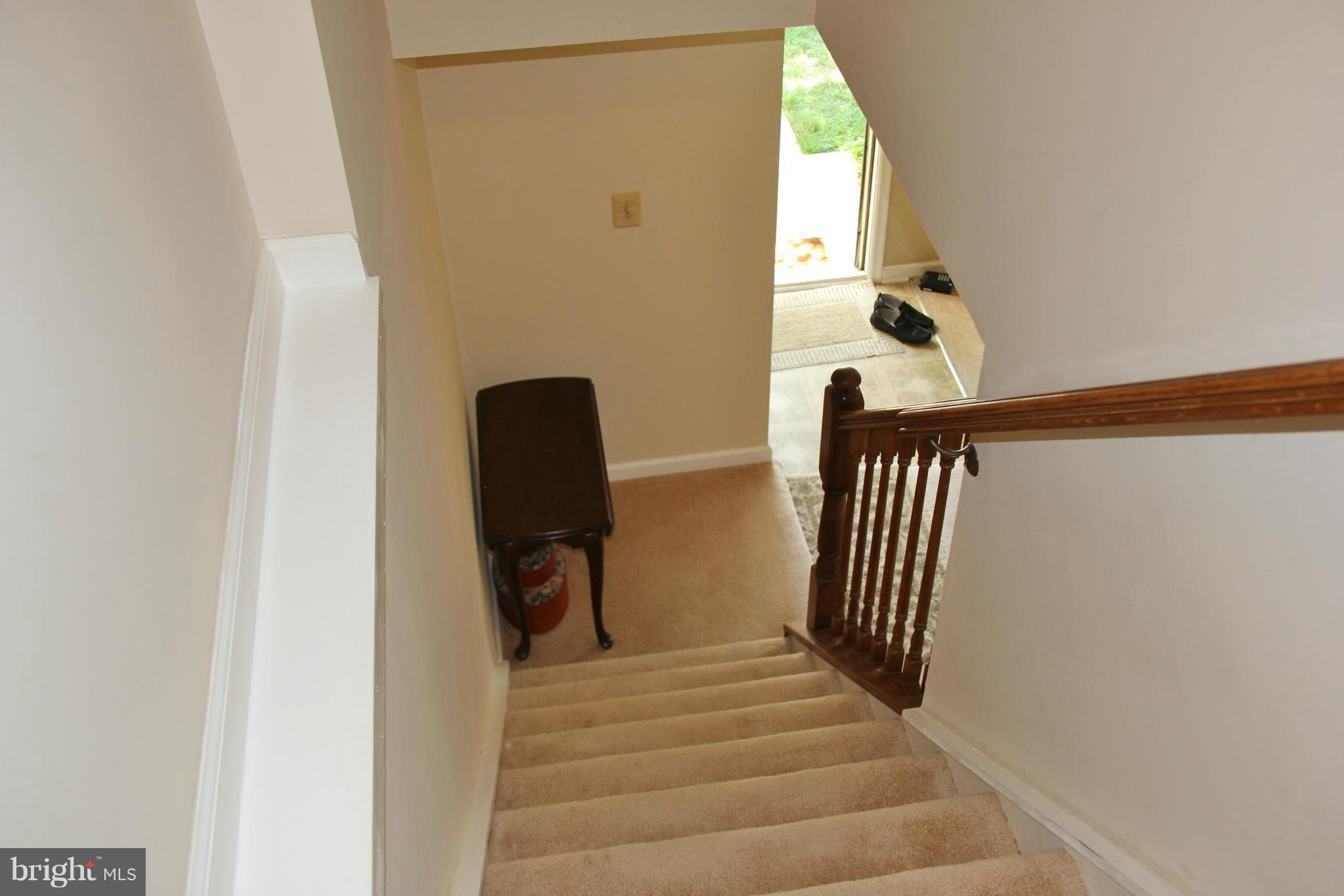 13969 Baton Rouge Court Centreville, VA 20121 - Photo 12 of 20 a view of entryway and hall with wooden floor