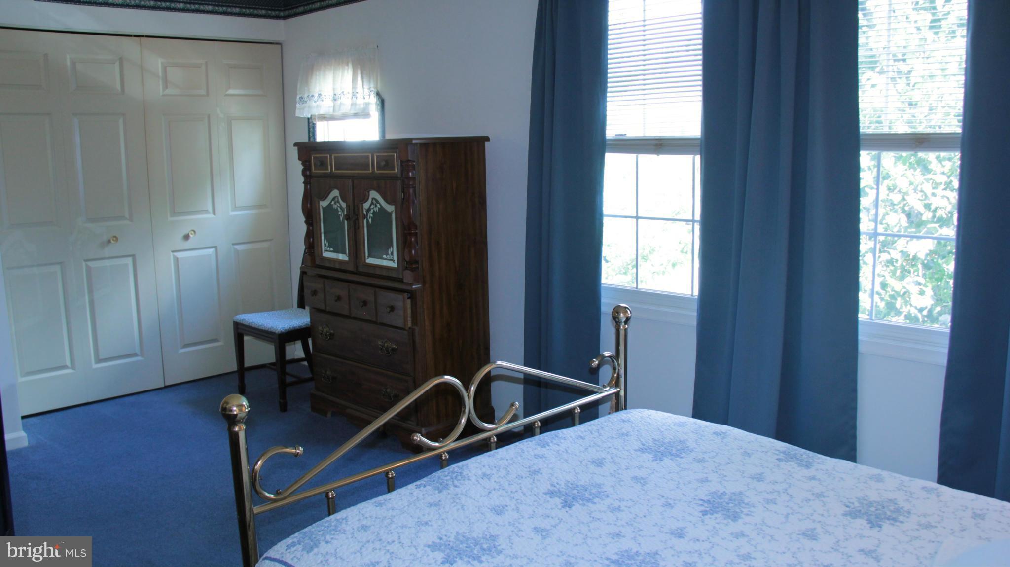 13969 Baton Rouge Court Centreville, VA 20121 - Photo 14 of 20 a view of a livingroom with furniture and windows