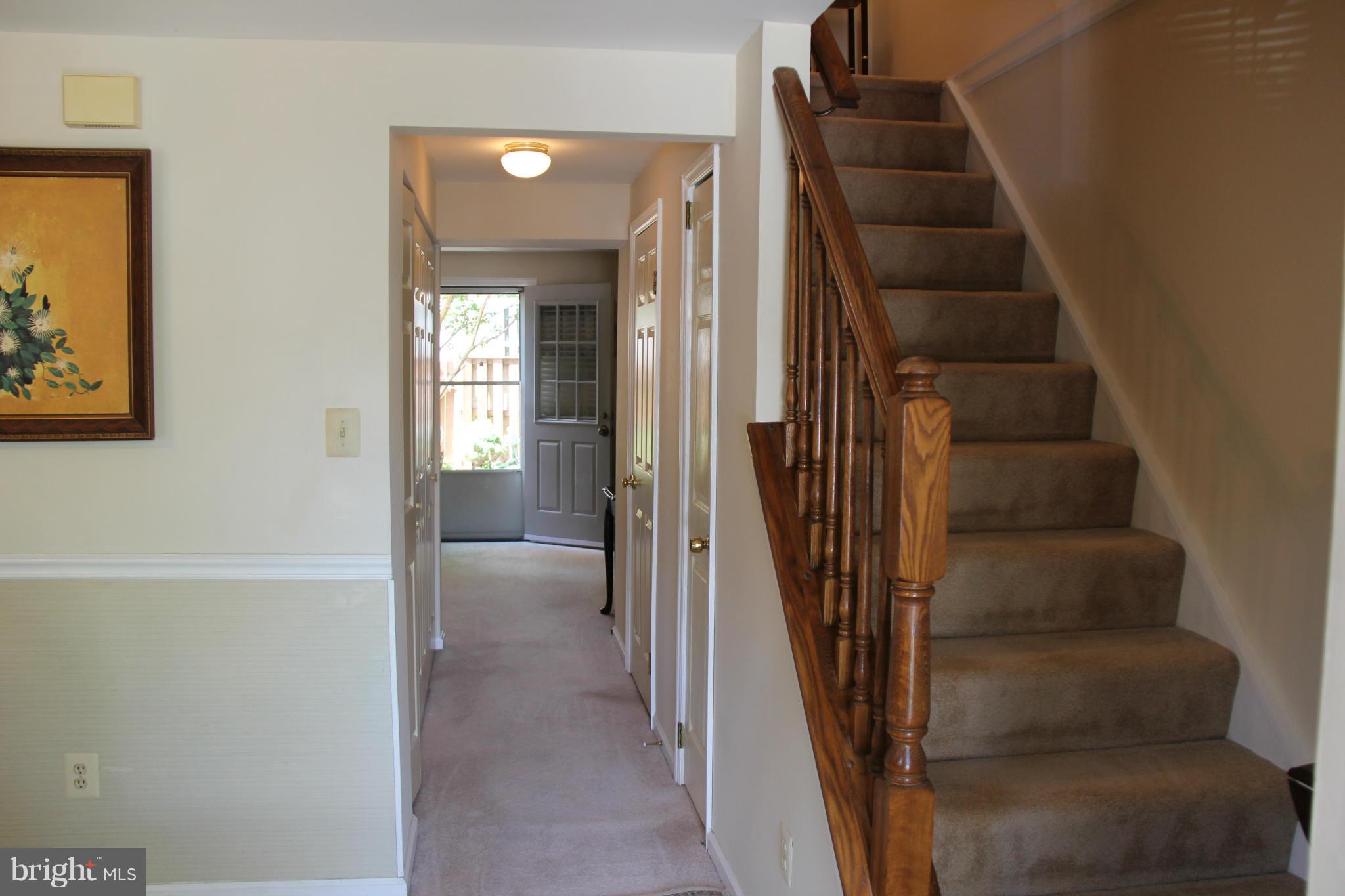 13969 Baton Rouge Court Centreville, VA 20121 - Photo 5 of 20 a view of staircase with white walls and railing