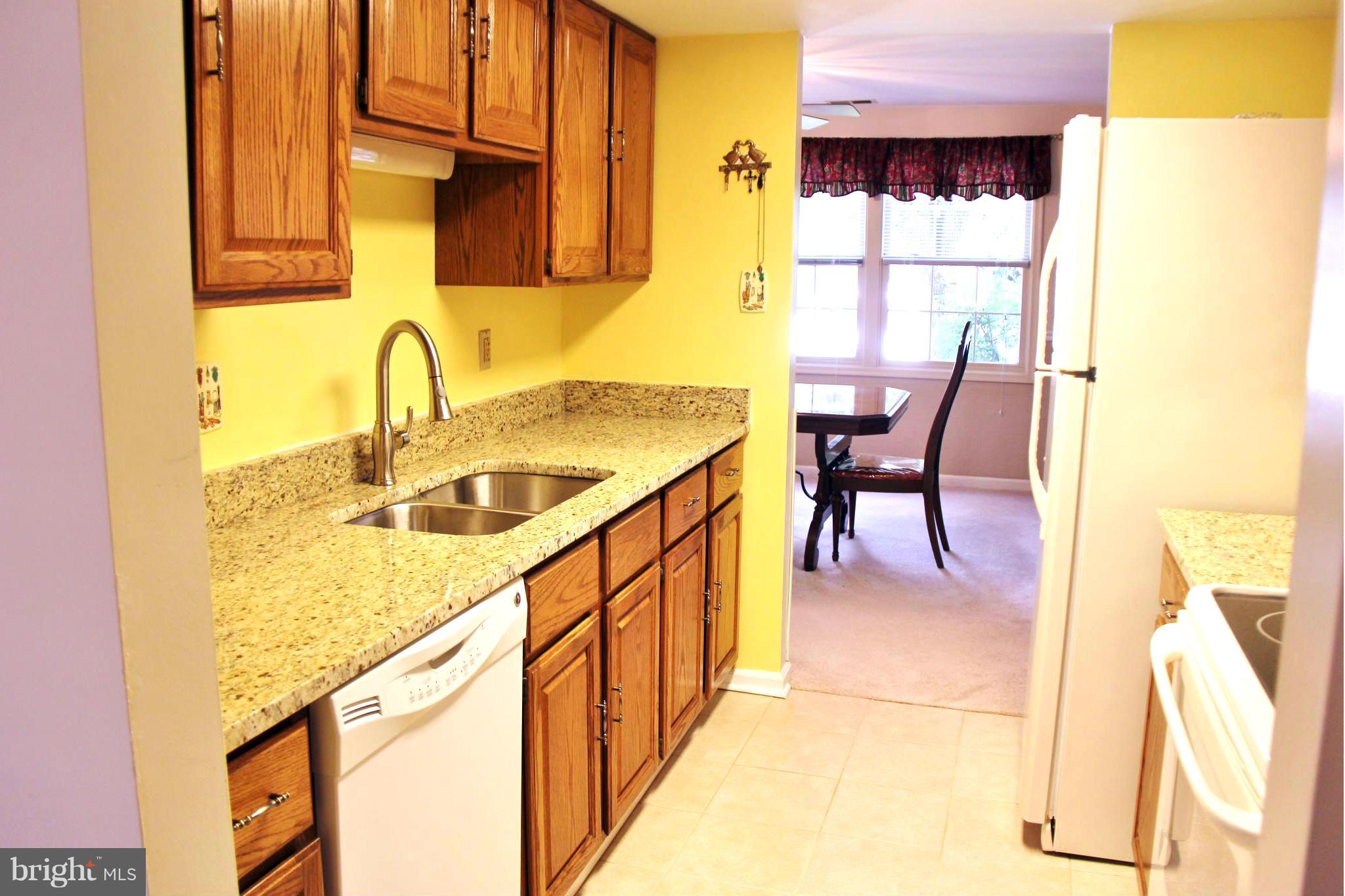 13969 Baton Rouge Court Centreville, VA 20121 - Photo 10 of 20 a kitchen with sink and cabinets