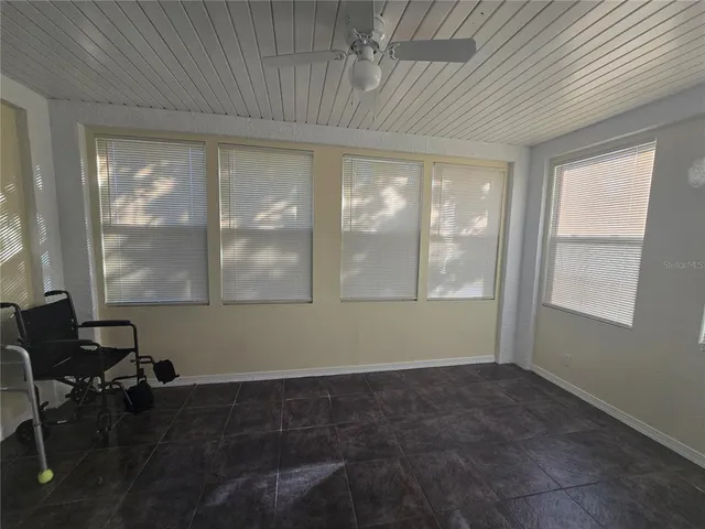 a room with furniture and windows