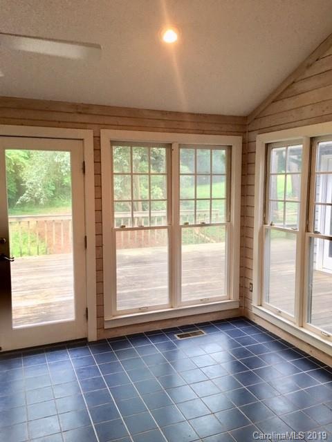 12905 Hamilton Pl Drive Fort Mill, SC 29708 - Photo 7 of 12 a view of an empty room with wooden floor and a window