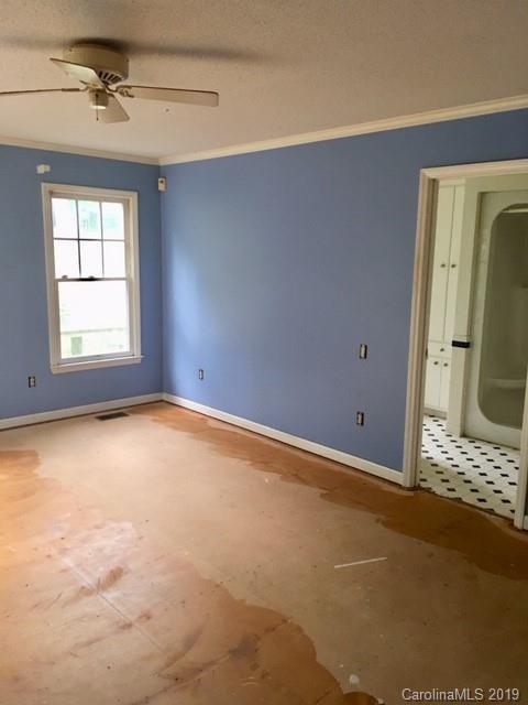 12905 Hamilton Pl Drive Fort Mill, SC 29708 - Photo 9 of 12 an empty room with a empty space and windows