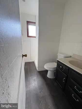 a bathroom with a sink and a toilet