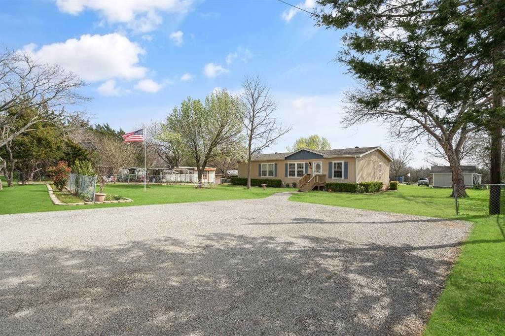 360 Rockcrest Road New Hope, TX 75071 - Photo 3 of 20 a view of an house with outdoor space and parking