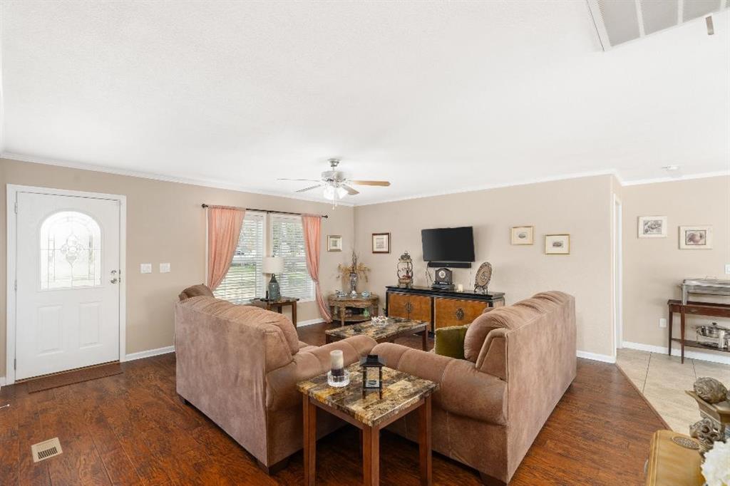 360 Rockcrest Road New Hope, TX 75071 - Photo 5 of 20 a living room with furniture fireplace and a large window