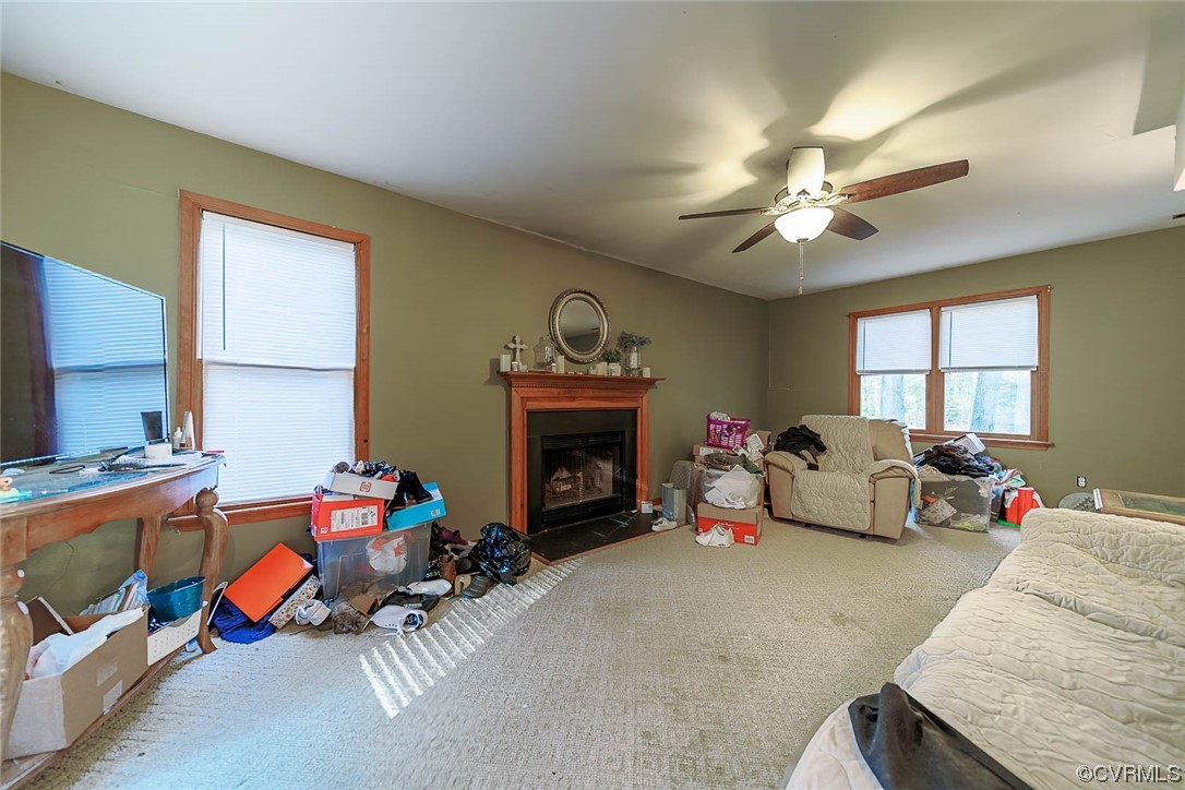5813 Mill Spring Road Midlothian, VA 23112 - Photo 4 of 7 a living room with furniture and a fireplace