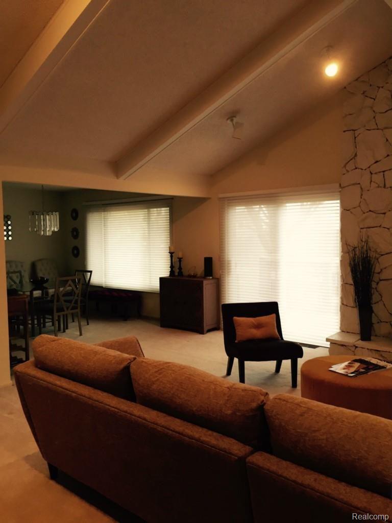 35371 Spring Hill Road Farmington, MI 48331 - Photo 11 of 14 View of vaulted ceiling in great room and custom stone fireplace