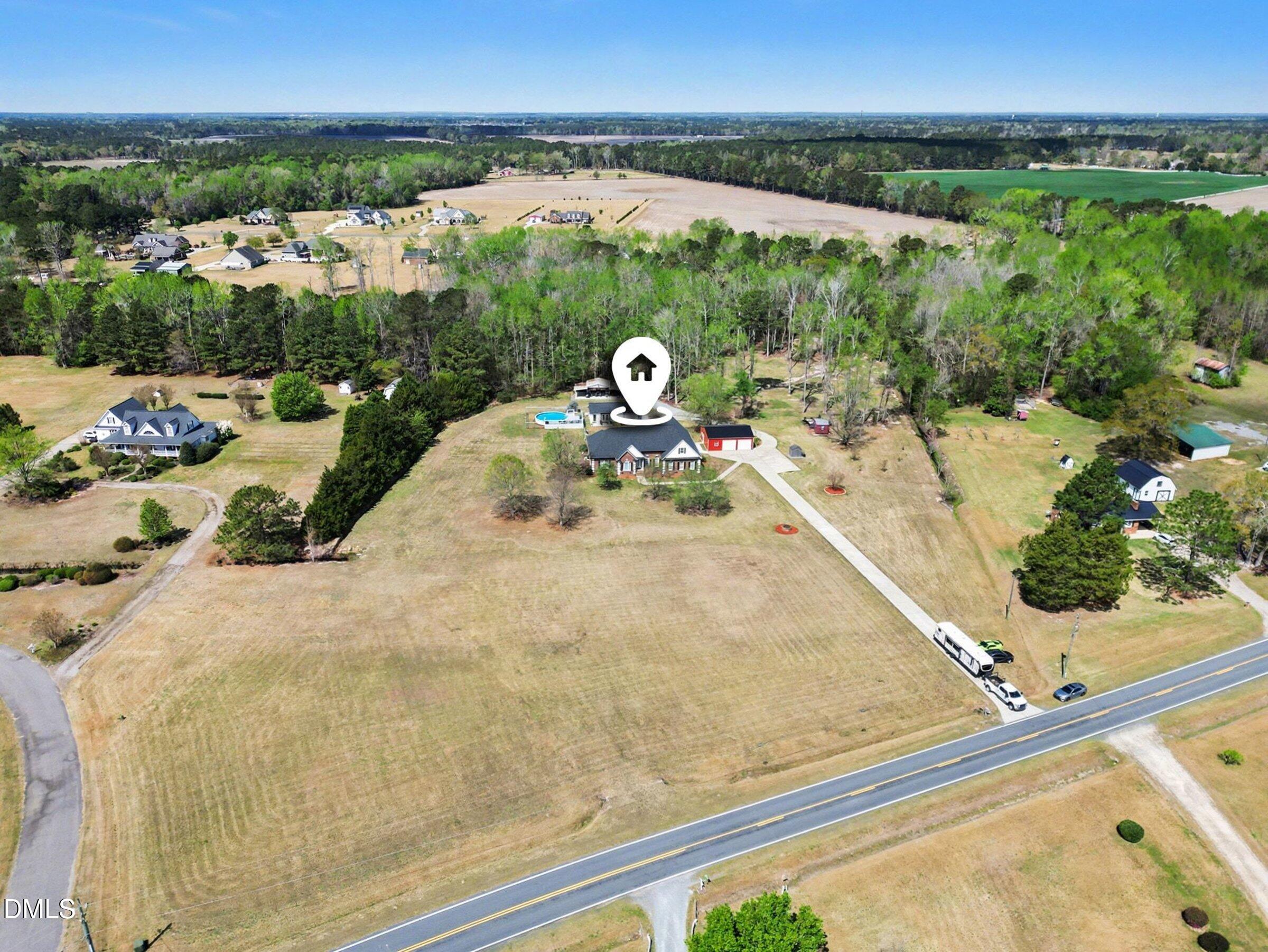 430 Fred Hall Road Stedman, NC 28391 - Photo 39 of 63 a view of a swimming pool with a balcony