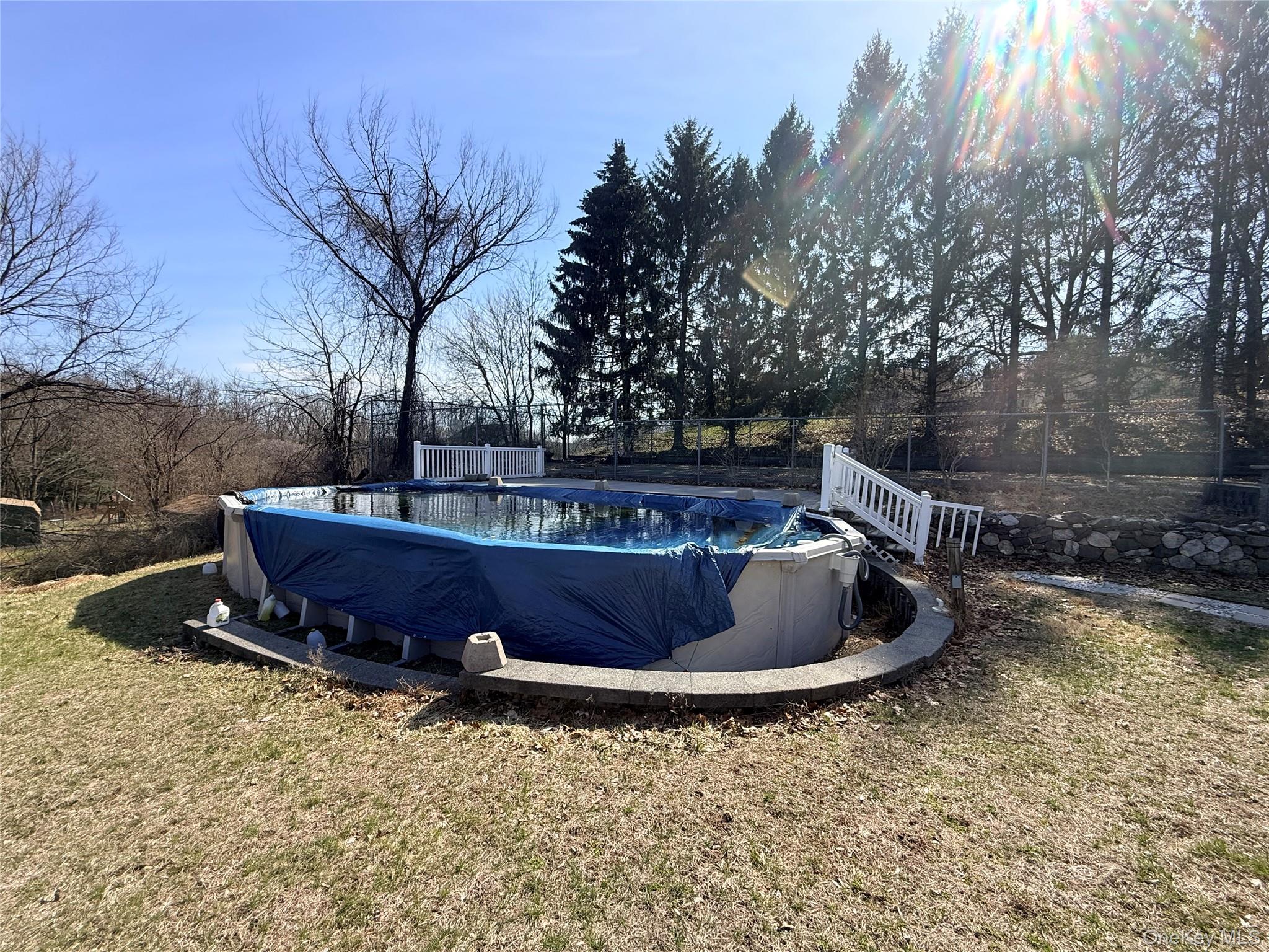 77 Upper Road Middletown, NY 10940 - Photo 16 of 21 a view of a backyard with plants and trees