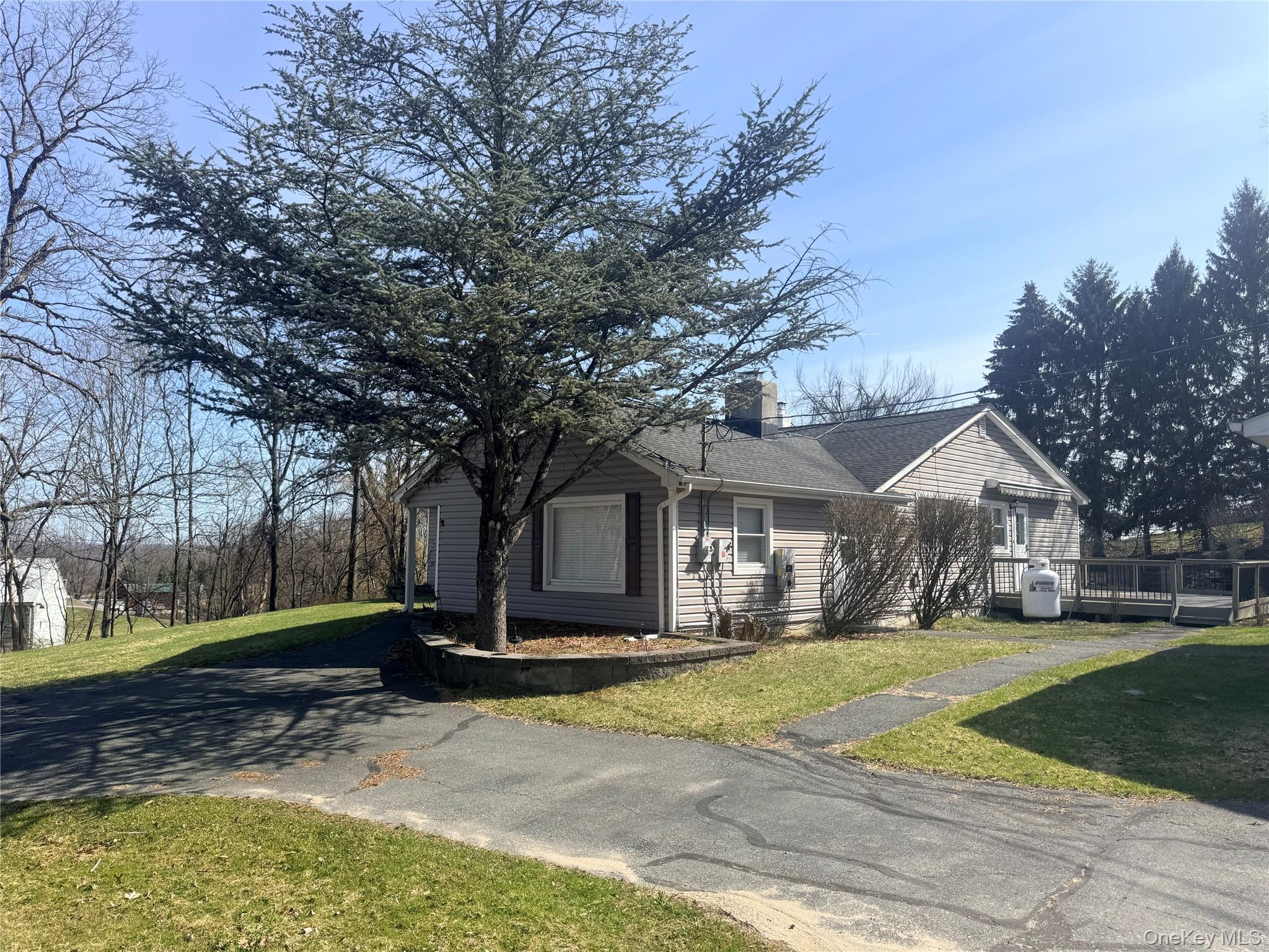 77 Upper Road Middletown, NY 10940 - Photo 2 of 21 a front view of house with yard and green space