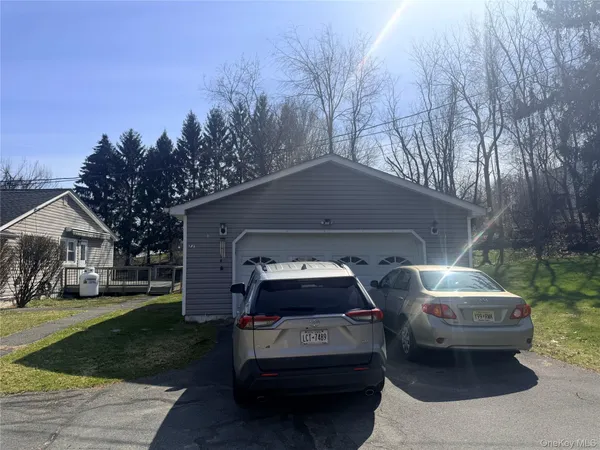 a car parked in front of a house