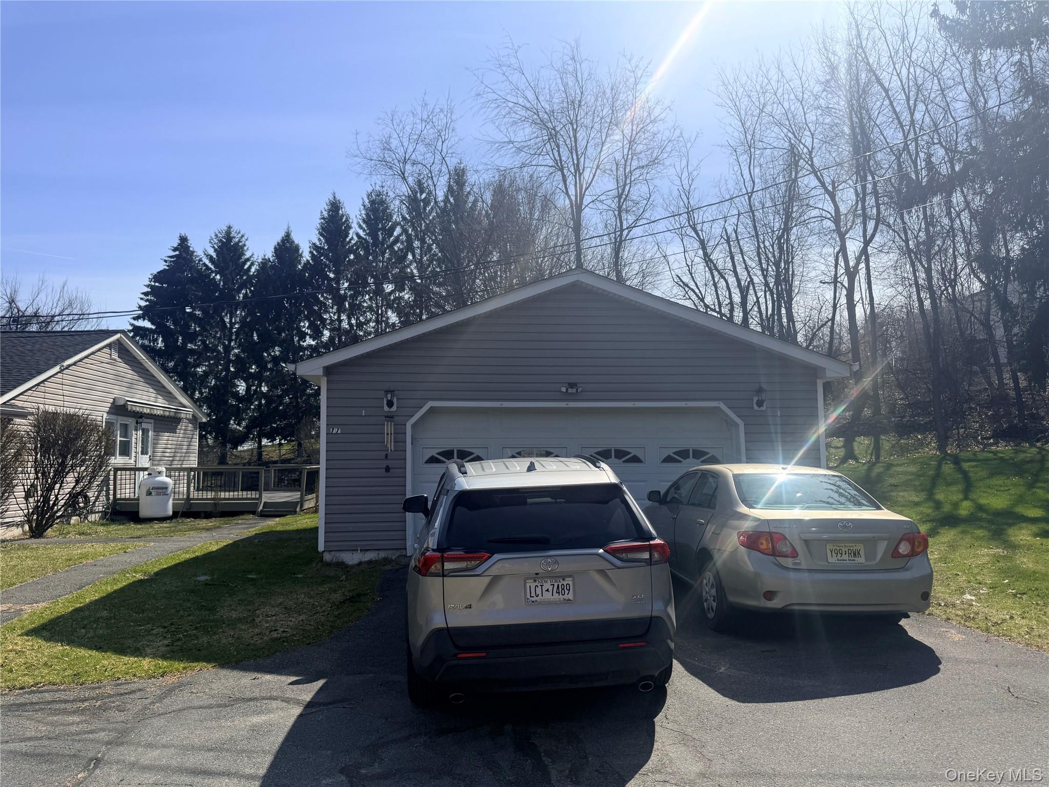 77 Upper Road Middletown, NY 10940 - Photo 3 of 21 a car parked in front of a house