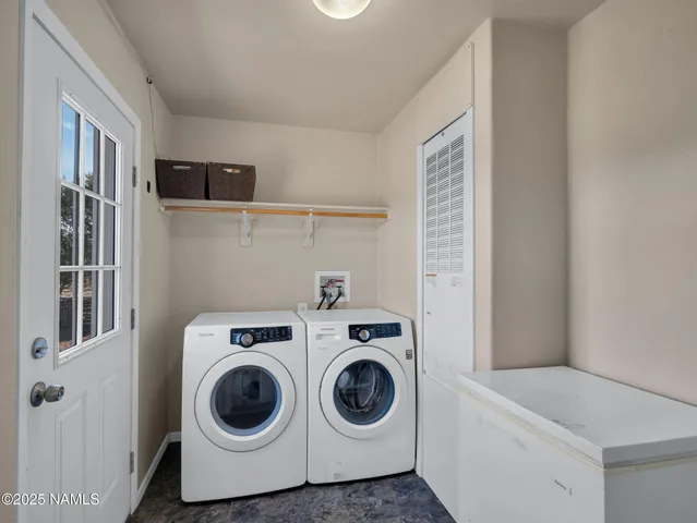 a utility room with dryer and washer