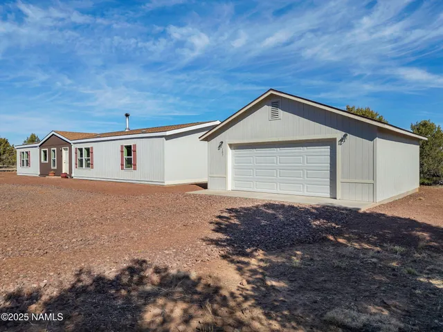 a house view with a backyard space