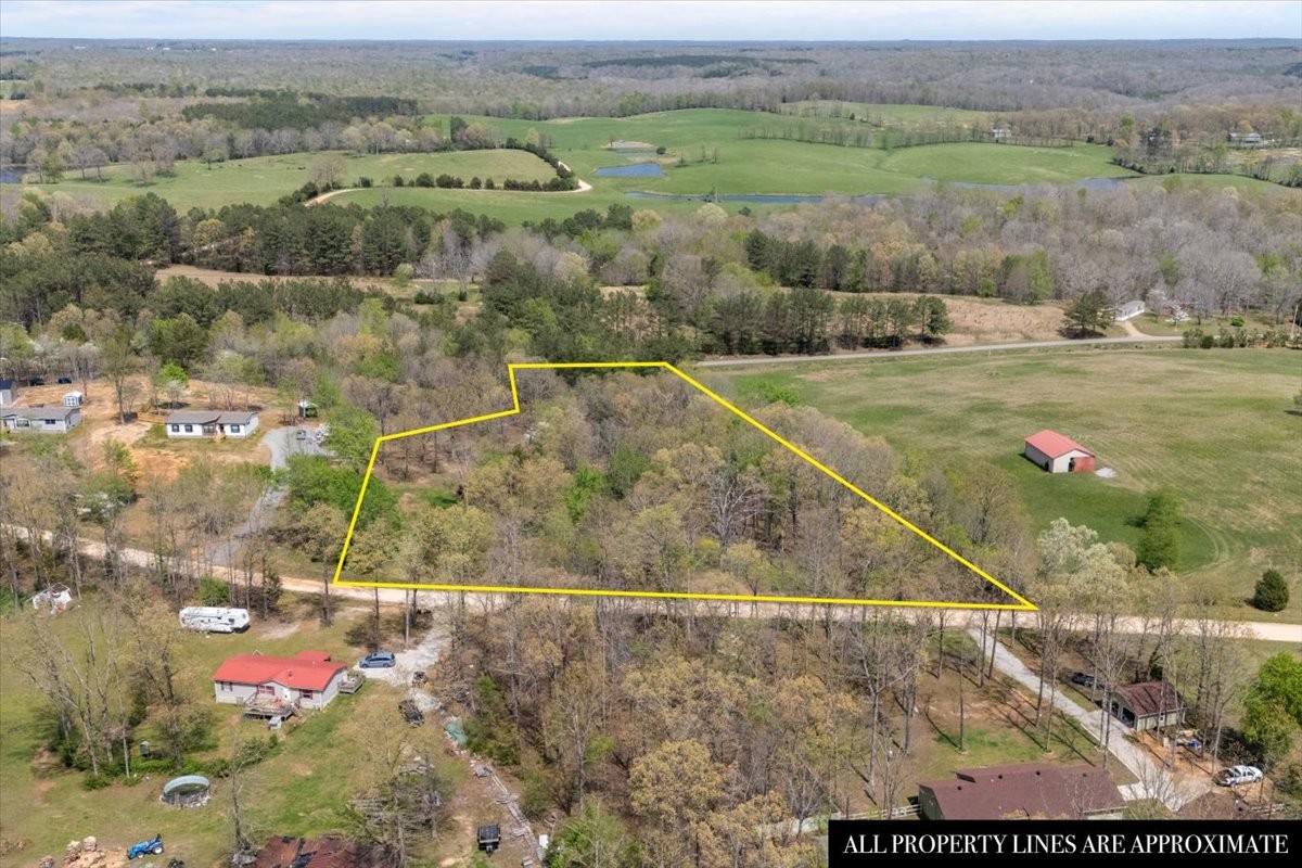 1837 Humphreys Co Line Road Dickson, TN 37055 - Photo 2 of 14 an aerial view of a houses