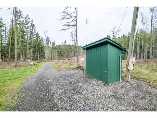 a backyard of a house with lots of green space