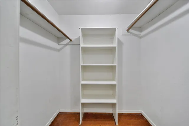 a view of an empty walk in closet