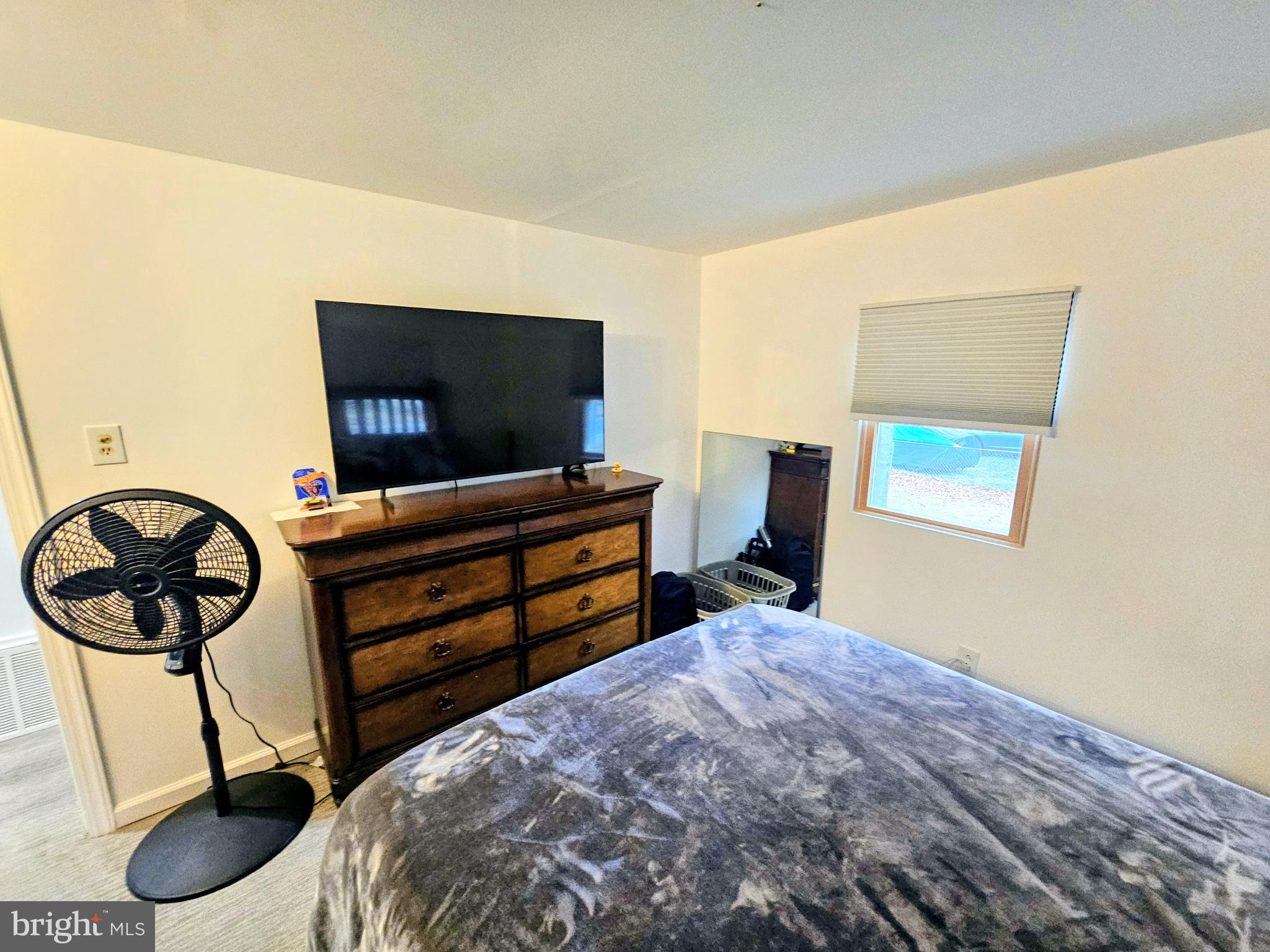 2891 Union Road Vineland, NJ 08361 - Photo 16 of 25 a bedroom with a bed and walk in closet