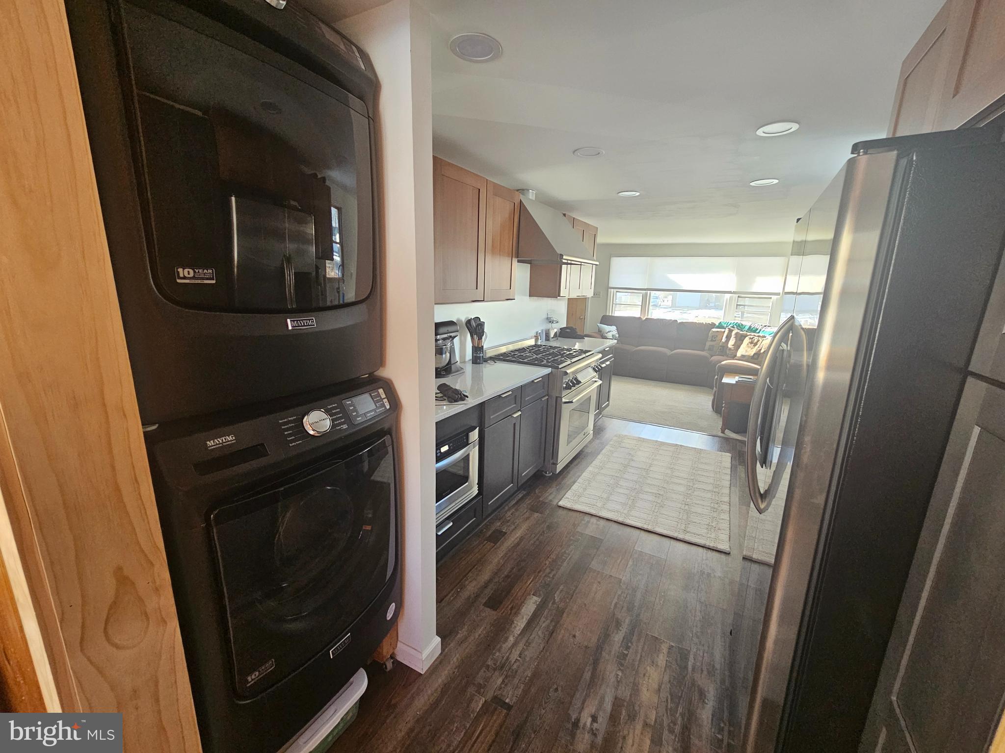 2891 Union Road Vineland, NJ 08361 - Photo 4 of 25 a kitchen with stainless steel appliances a stove a microwave a sink and a refrigerator