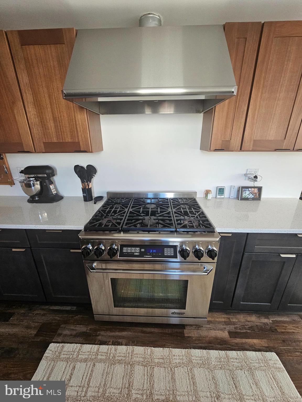 2891 Union Road Vineland, NJ 08361 - Photo 5 of 25 a stove top oven sitting inside of a kitchen