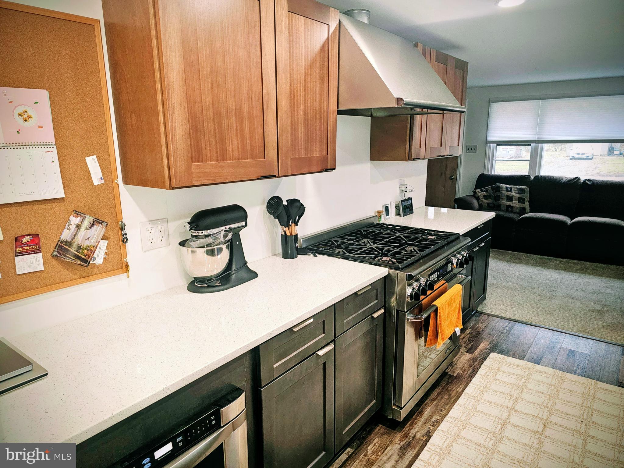 2891 Union Road Vineland, NJ 08361 - Photo 8 of 25 a kitchen with stainless steel appliances a stove a sink cabinets and a refrigerator