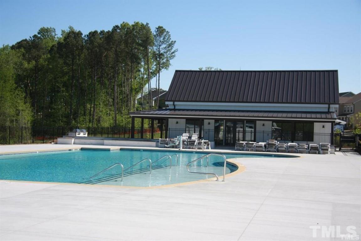 2919 Sunflower Road Apex, NC 27502 - Photo 34 of 34 a view of a house with sitting area and garden