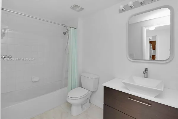 a view of an empty room and closet