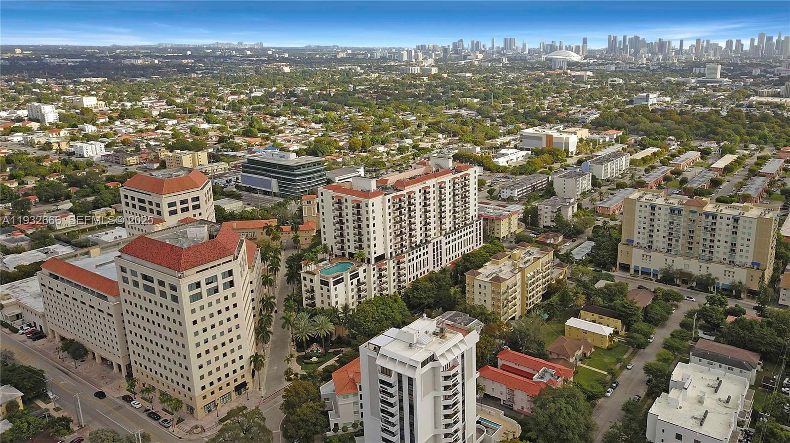 888 Douglas Road, Unit 1203 Coral Gables, FL 33134 - Photo 4 of 27 an aerial view of residential building with parking