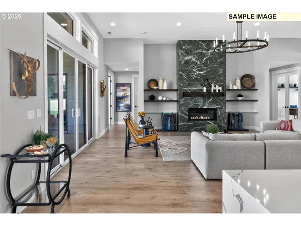 a view of hallway with wooden floor
