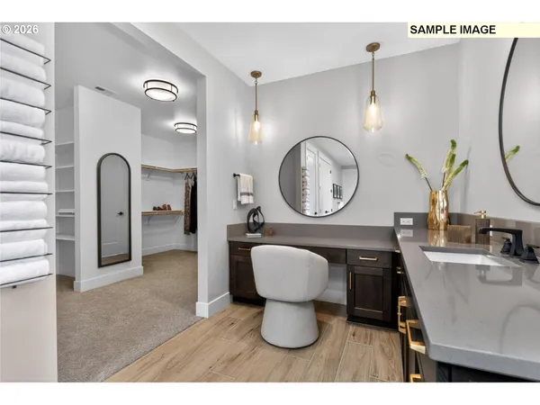 a view of kitchen with furniture and wooden floor