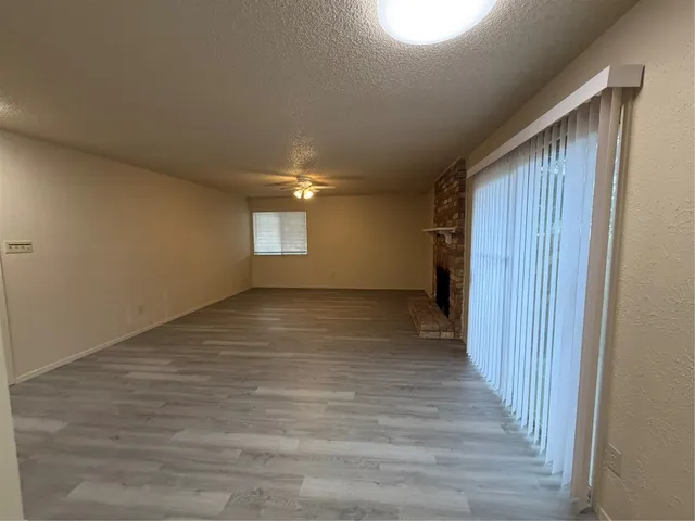 a kitchen with a stove a refrigerator and a sink