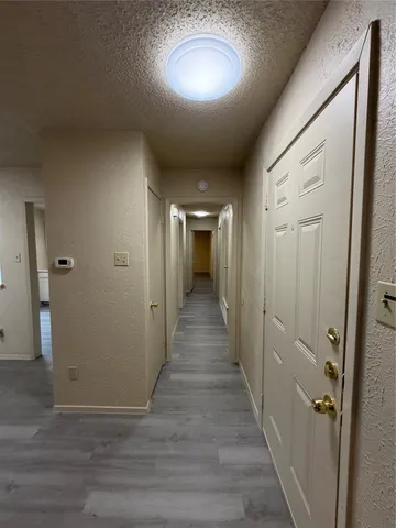 a kitchen with a refrigerator a sink and a stove