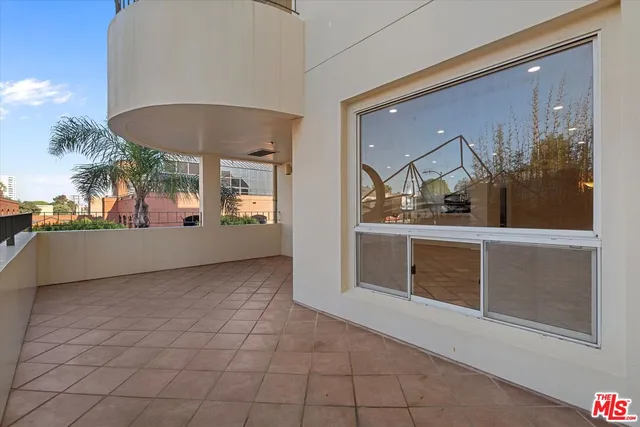 a view of a living room and entryway