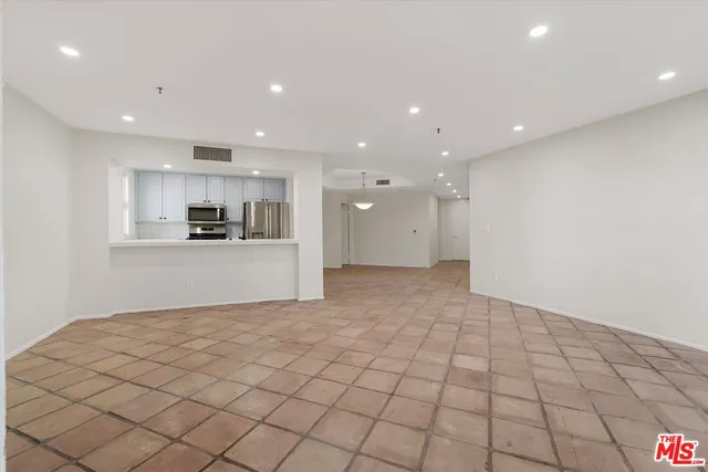 a view of a kitchen with a sink
