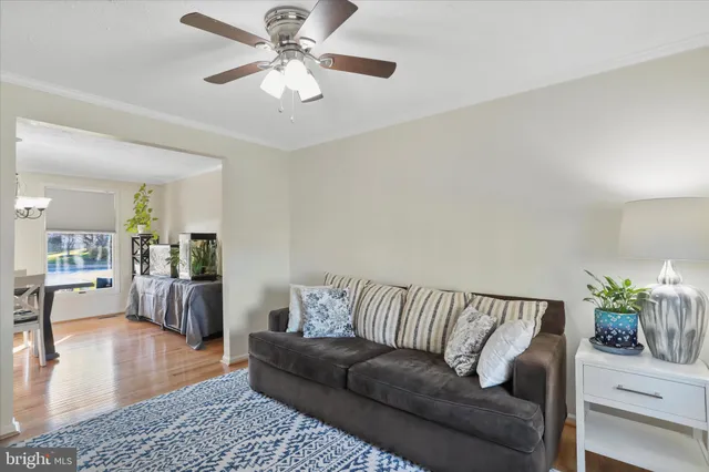 a bathroom with a toilet sink vanity and mirror