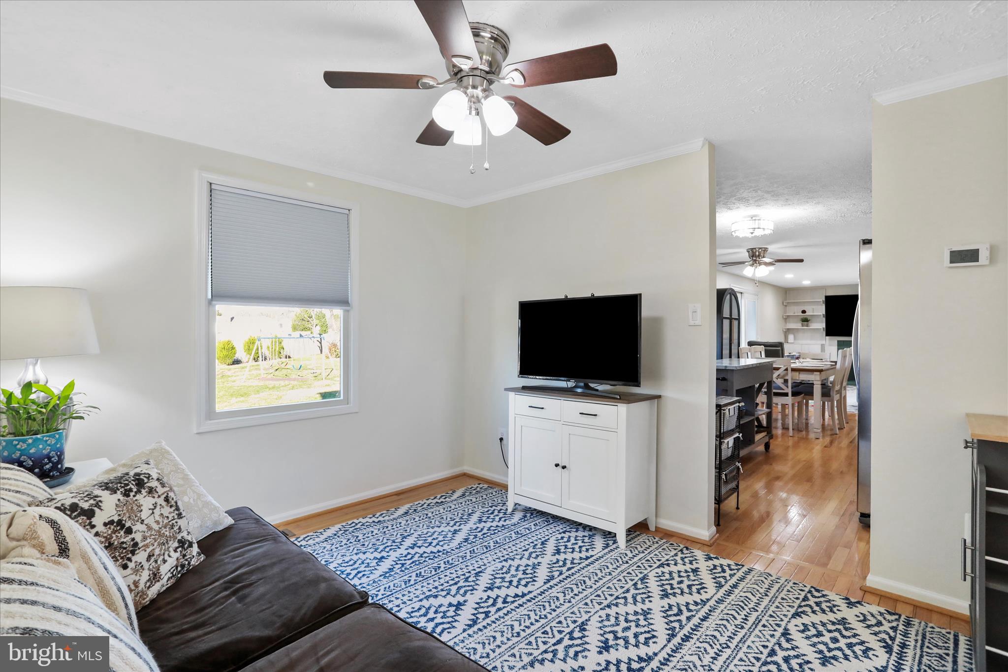 5435 Tree Line Drive Centreville, VA 20120 - Photo 19 of 51 a living room with furniture and a flat screen tv