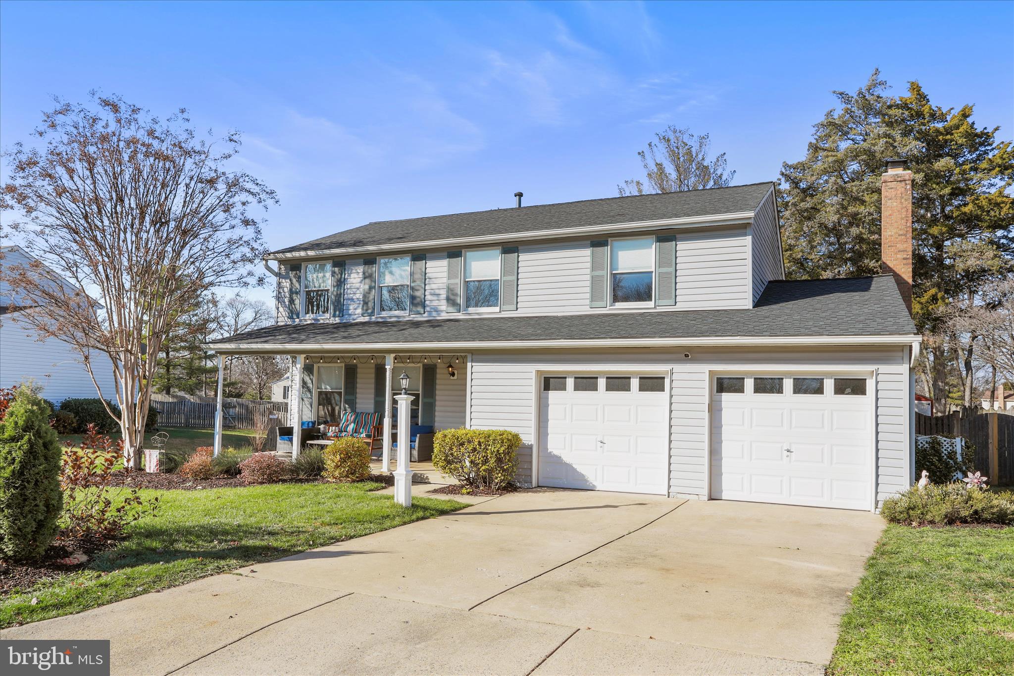 5435 Tree Line Drive Centreville, VA 20120 - Photo 2 of 51 front view of a house with a garden