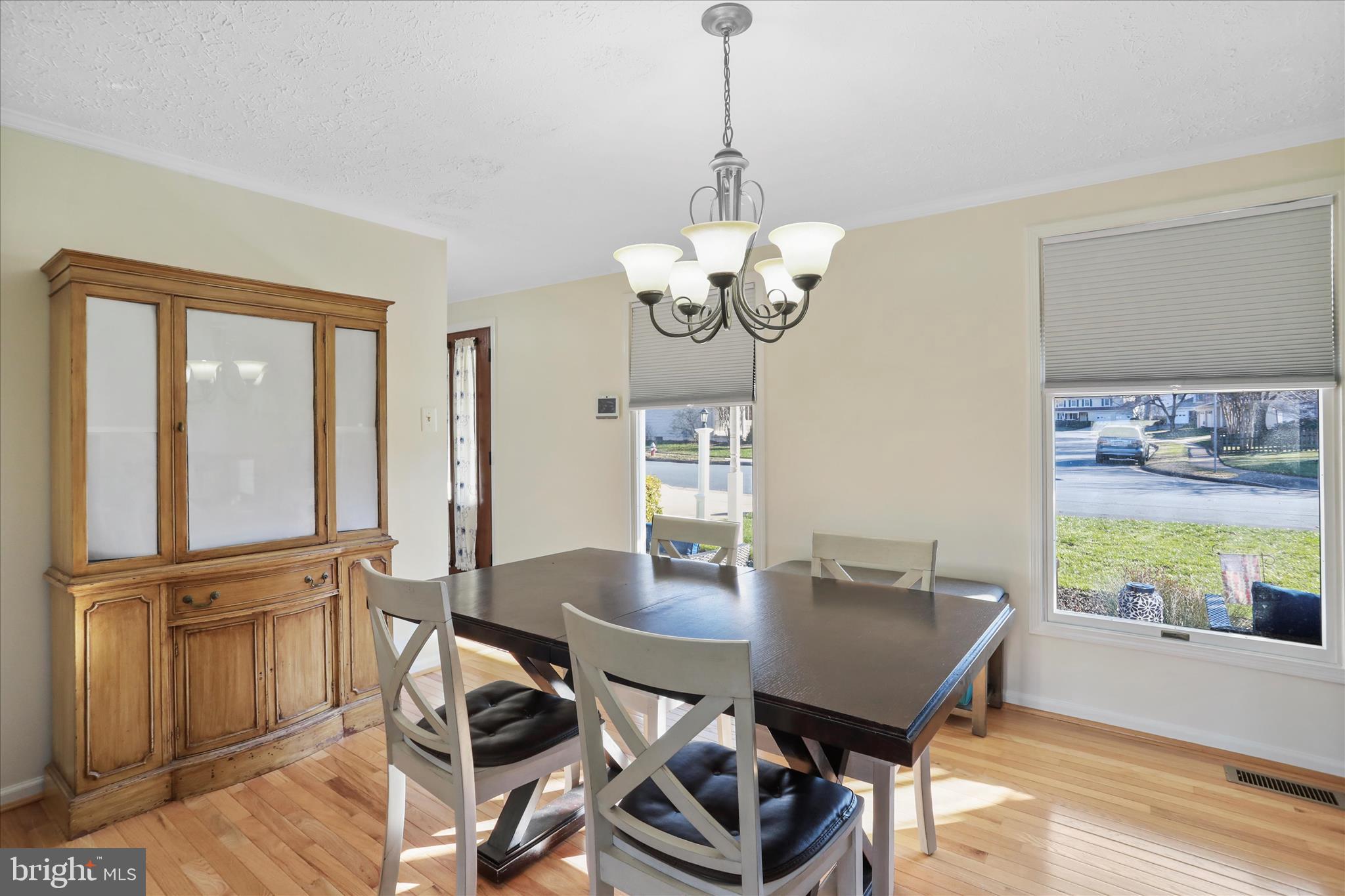 5435 Tree Line Drive Centreville, VA 20120 - Photo 21 of 51 a view of a dining room with furniture window and wooden floor